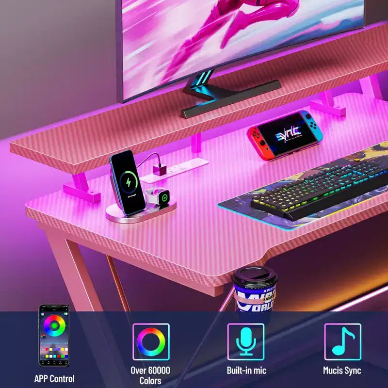 Bureau de jeu d'angle en L rose avec support d'écran et 3 étagères de rangement, bureau de joueur moderne en fibre de carbone pour un gain de place